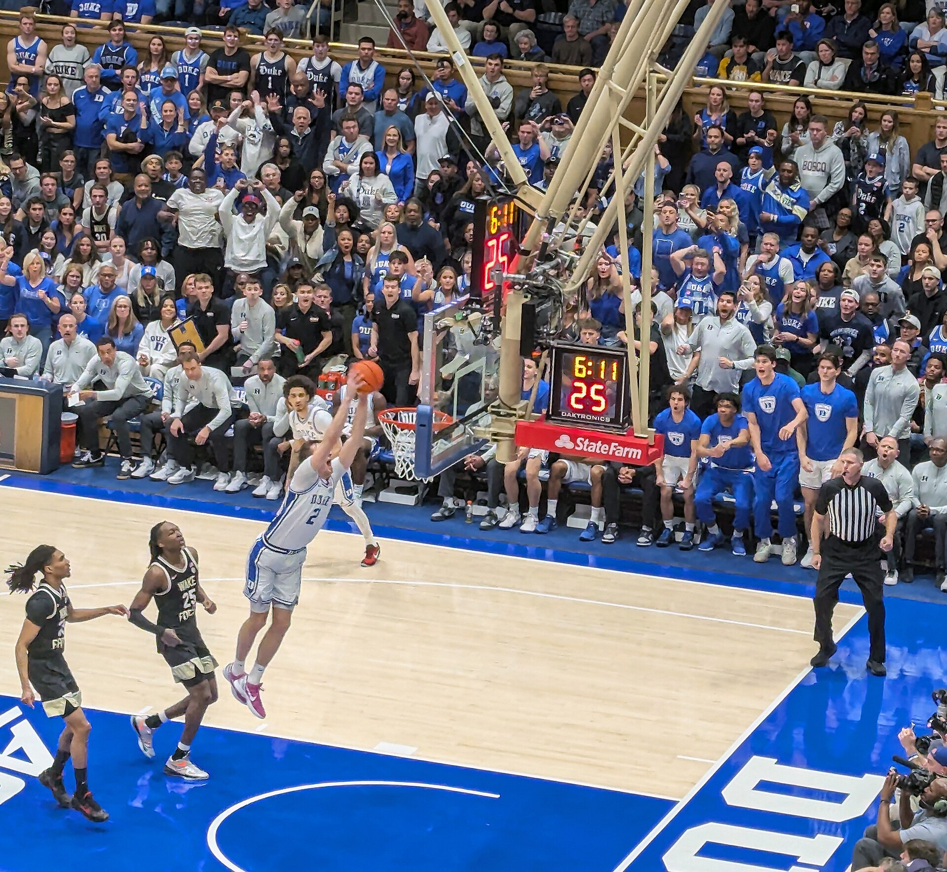 Cooper Flagg elevating toward the rim with the ball overhead